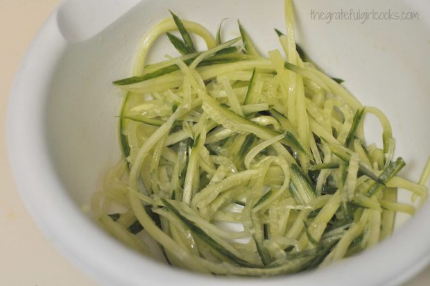 Thinly sliced cucumber for fish sandwich.