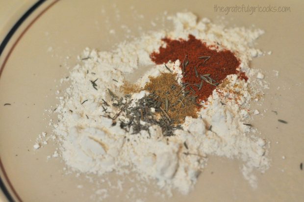 Flour and spices are mixed together for fish coating