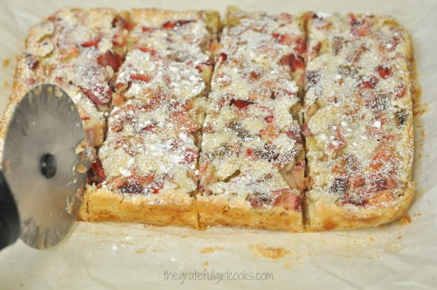 Strawberry-Rhubarb Dream Bars are sliced into 16 portions for serving.