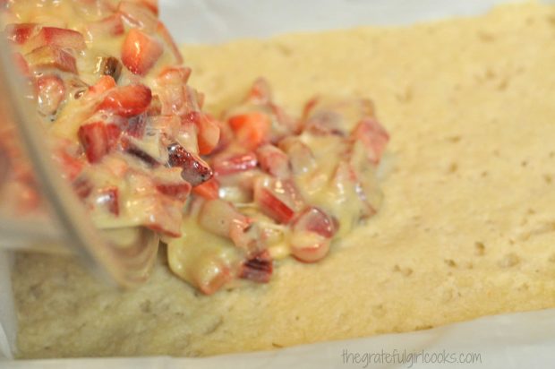 The filling is poured onto the top of the hot, baked crust.