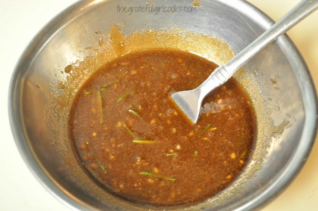 Marinade for pork chops in small metal bowl