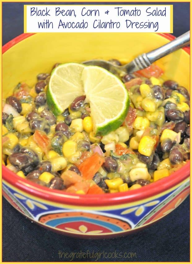 Healthy black bean corn tomato salad, topped with a creamy avocado cilantro dressing is a perfect Southwestern-style side dish for any get together.