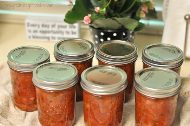 Homemade jars of Italian-style tomato sauce ready to go into pantry.