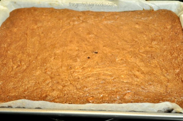 Brownies are removed from oven after baking, to cool.