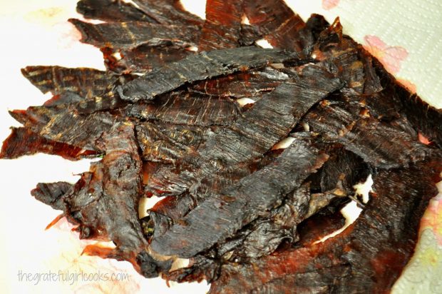Pieces of beef jerky on paper towel