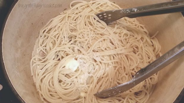 Pasta With Italian Sausage features buttered, seasoned spaghetti noodles.