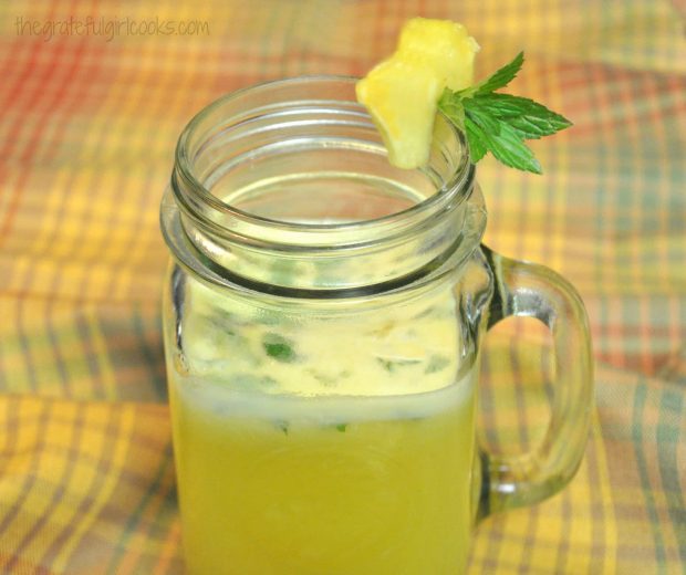 Pineapple lime mint agua fresca is served cold over ice!