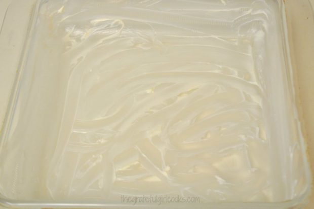 Baking dish for vegetable tian is coated with softened butter