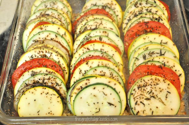 Partially baked summer vegetable tian with Italian seasoning.