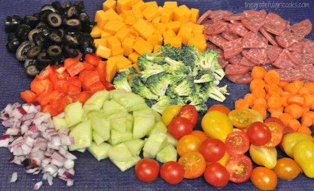 All the ingredients for the salad are cut and chopped while pasta is cooking.