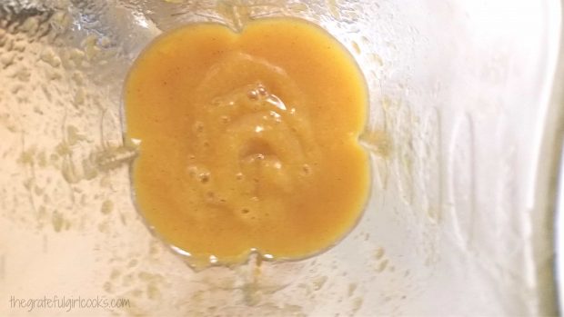 The blended peach coulis is a completely smooth sauce after mixing.