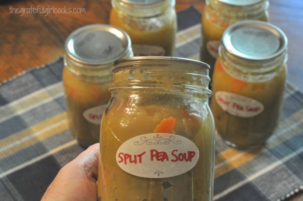A jar of canned split pea and ham soup is ready to store in the pantry!
