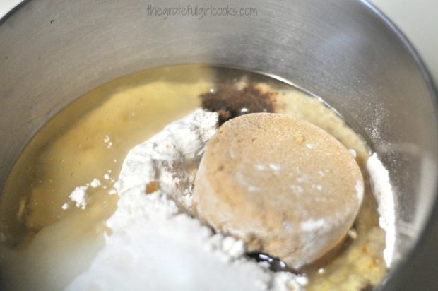 Flour, brown sugar, oil and spices are mixed in a bowl.