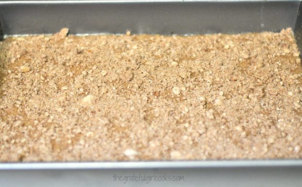 Streusel topping is added to the surface of the coffeecake batter.