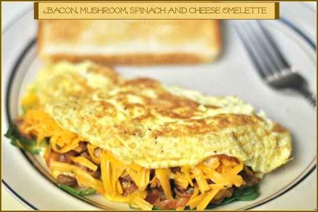 Hungry for a filling breakfast? Whip up this bacon mushroom cheese omelette, with fresh spinach leaves thrown in for good measure. It's delicious!