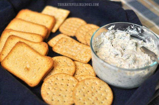 Homemade Boursin Cheese is served with a variety of crackers.