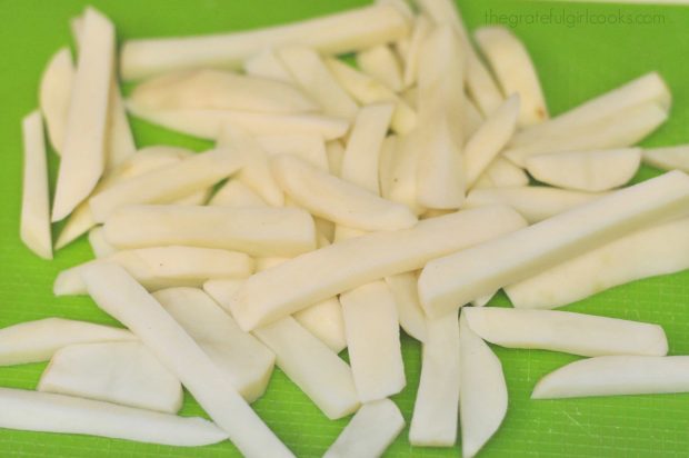 Potatoes are cut into sticks before frying