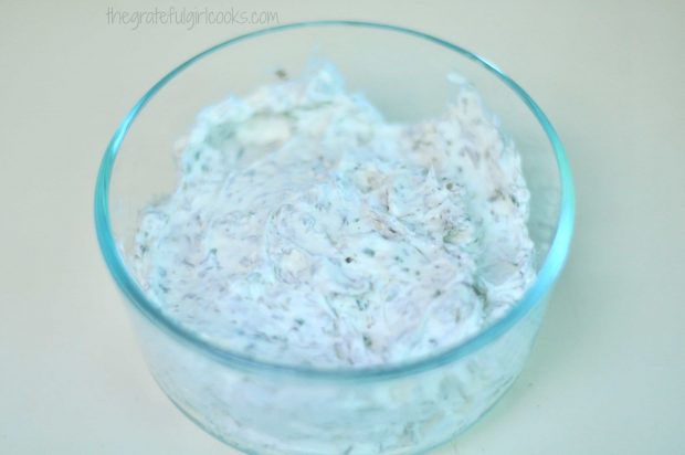 Homemade Boursin Cheese in small bowl, before refrigerating overnight.