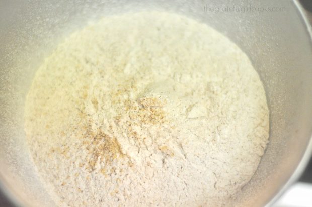 Flour and spices are sifted before adding them to wet batter for Starbucks gingerbread.