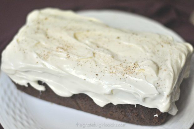 Starbucks Gingerbread (copycat) is frosted once cool, then sprinkled with nutmeg.