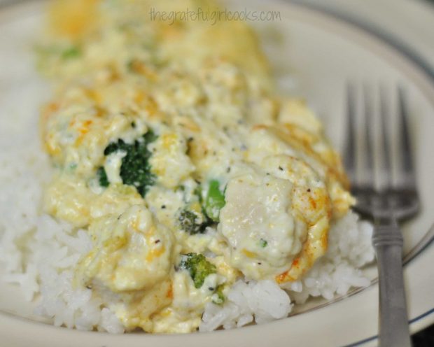 Chicken divan over rice, on plate with fork