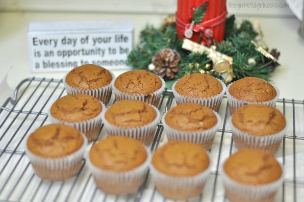 Gingerbread muffins out of oven, cooling on wire rack.