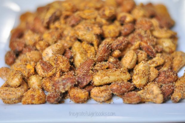 Close up photo of Tex-Mex party nuts on white plate.