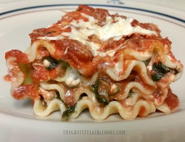 Each of the Veggie Lasagna Rollups are served hot, on a plate. 