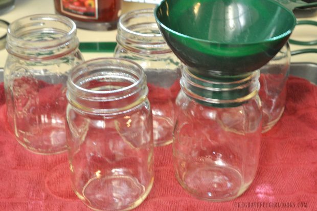 Sterilized, hot canning jars are ready for the beans to be added.