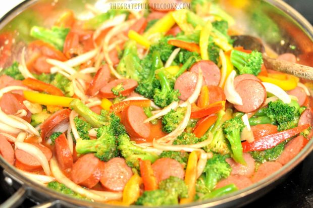 Smoked Sausage Veggie Rice Skillet is heated until liquid is absorbed.