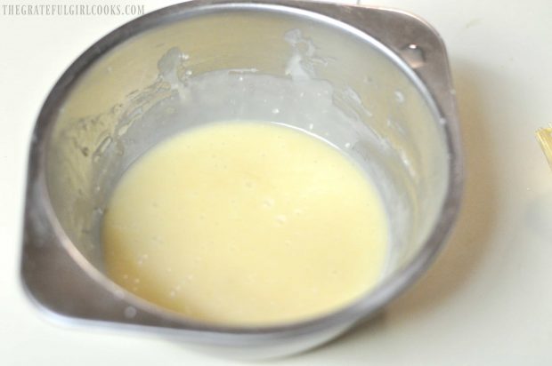 Lemon glaze for icing the scones in small metal bowl