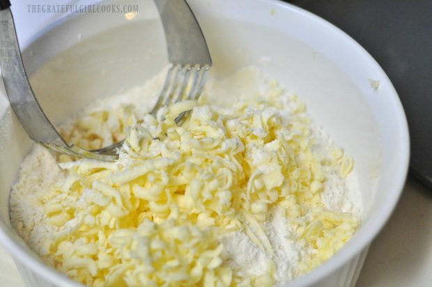 Pastry blender is used to incorporate grated butter into flour for scones