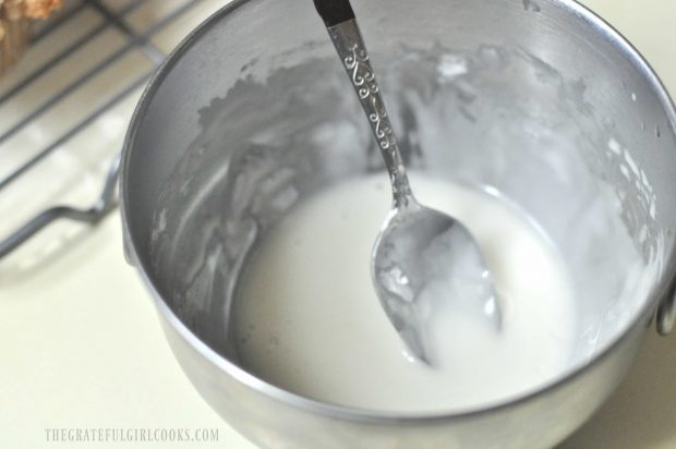 Glaze for muffins mixed in metal bowl