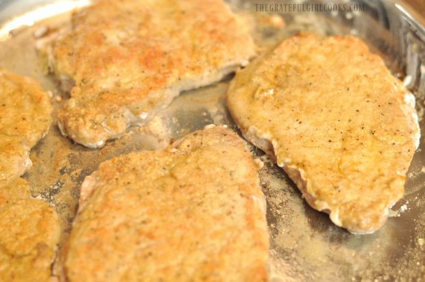 Cumin dusted pork cutlets are browned on all sides.