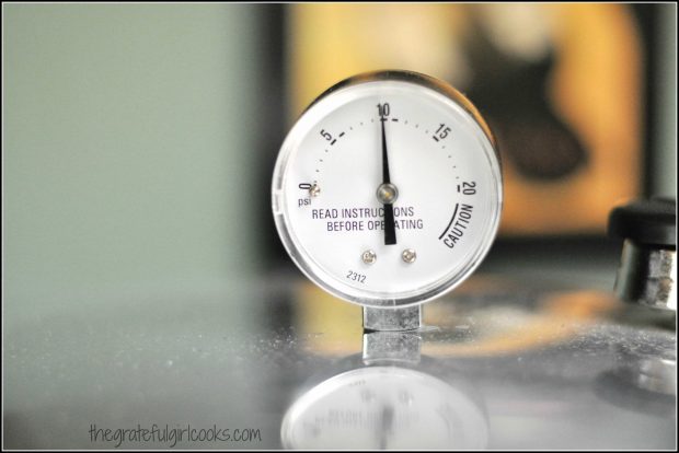 Canned asparagus is processed at 10 pounds pressure, as shown on the canner gauge.