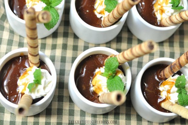 Irish Chocolate Pots de Crème, garnished with cookies, whipped cream, mint, and Irish cream syrup.