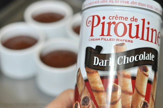 Cookies are used to garnish the finished Irish Chocolate Pots de Crème.