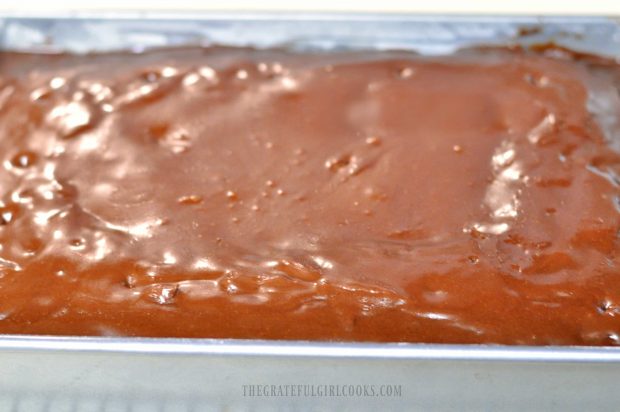 Mom's easy cake is baked then frosted with chocolate icing