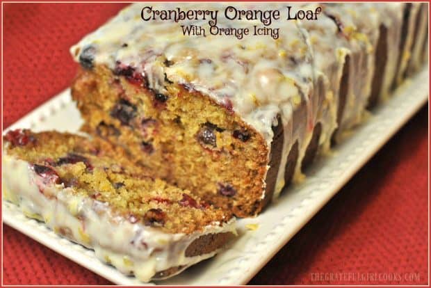 Cranberry Orange Loaf with Orange Icing is a deliciously flavored sweet bread, topped with a creamy citrus icing! Enjoy a taste of the holidays with a slice!