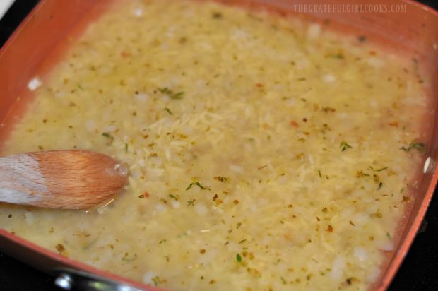 White wine and chicken broth is added to the skillet.