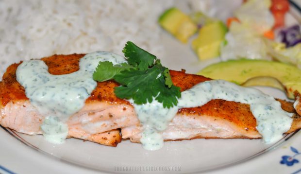 Cilantro lime sauce and fresh cilantro garnish the pan-seared salmon.