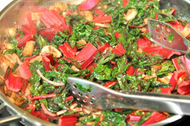 Minced garlic, salt and pepper added to cooked Swiss chard.