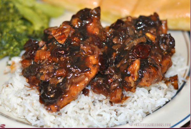 Cranberry chicken is served over white rice.
