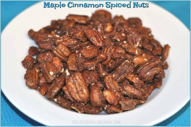 Maple cinnamon spiced nuts are a great snack, featuring pecans, cashews and almonds coated with maple syrup, sugar and spices, then baked until done.