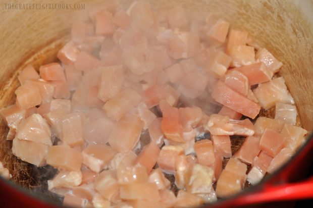 Chicken breasts are cubed, then pan-seared to make chicken peanut stew.