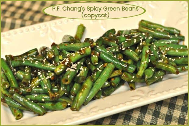 P.F. Chang's spicy green beans are fresh green beans cooked in a flavorful Asian sauce, in this delicious restaurant copycat recipe!