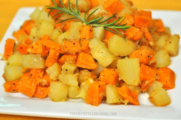 Potato Hash with Rosemary is served on white plate