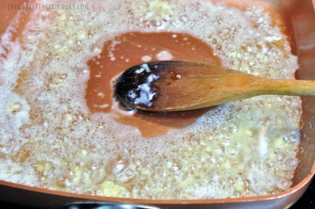 Butter, garlic and olive oil are heated in skillet before adding shrimp.