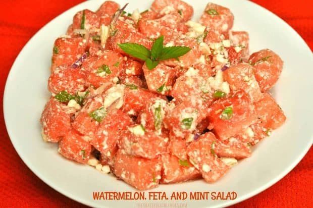 Sweet, cold watermelon feta mint salad with fresh mint, salty feta cheese crumbles and red onion is an easy, delicious salad for a hot Summer day!
