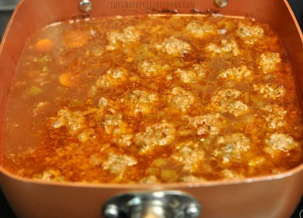 Simmering albondigas soup